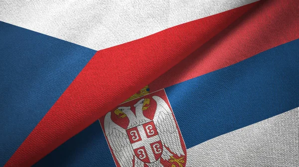 República Checa y Serbia dos banderas tela textil, textura de la tela —  Fotos de Stock