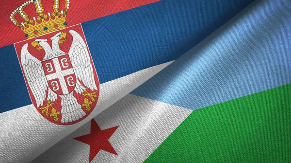 Serbia dan Djibouti dua bendera kain tekstil, tekstur kain — Stok Foto