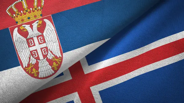 Sérvia e Islândia duas bandeiras de pano têxtil, textura de tecido — Fotografia de Stock