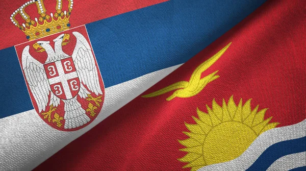 Srbsko a Kiribati dvě vlajky textilní tkaniny, textura textilií — Stock fotografie