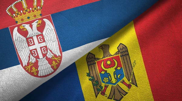 Srbsko a Moldavsko dvě vlajky textilní tkaniny, textura textilií — Stock fotografie