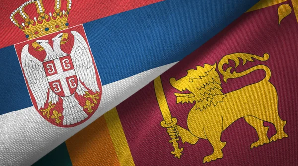 Srbsko a Srí Lanka dvě vlajky textilní tkaniny, textura textilií — Stock fotografie