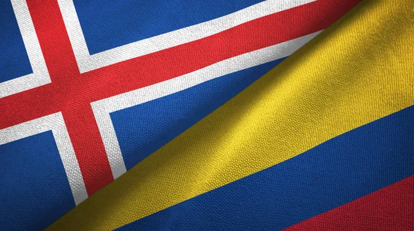 Islândia e Colômbia duas bandeiras de pano têxtil, textura de tecido — Fotografia de Stock