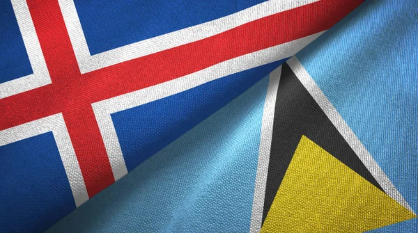 Ісландія і Сент-Люсія два прапори текстильна тканина, текстура тканини — стокове фото