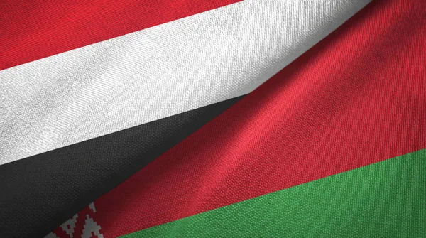 Jemen und Weißrussland zwei Flaggen Textilstoff, Textur — Stockfoto