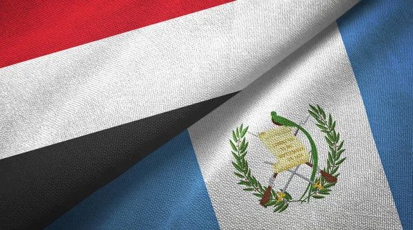Yemen and Guatemala two flags textile cloth, fabric texture — 스톡 사진