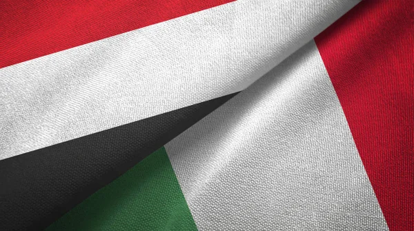 Jemen und Italien zwei Flaggen Textilstoff, Textur — Stockfoto