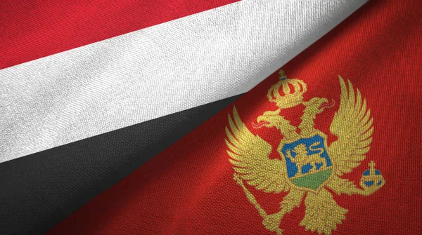 Jemen och Montenegro två flaggor textilduk, tyg struktur — Stockfoto