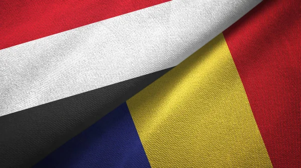 Jemen en Roemenië twee vlaggen textiel doek, weefsel textuur — Stockfoto