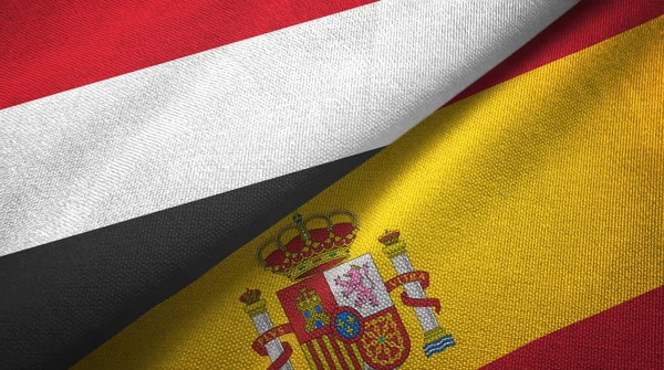Yemen and Spain two flags textile cloth, fabric texture