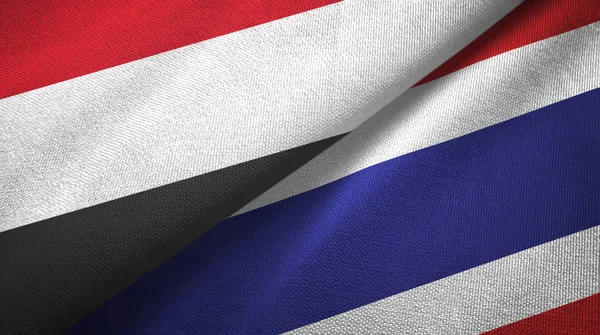 Yemen e Thailandia due bandiere tessuto, tessitura tessuto — Foto Stock