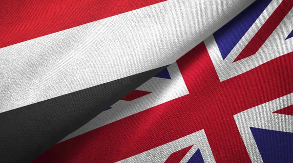 Jemen och Storbritannien två flaggor textilduk, textur — Stockfoto