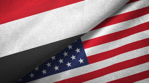 Yemen e Stati Uniti due bandiere tessuto, tessitura tessuto — Foto Stock