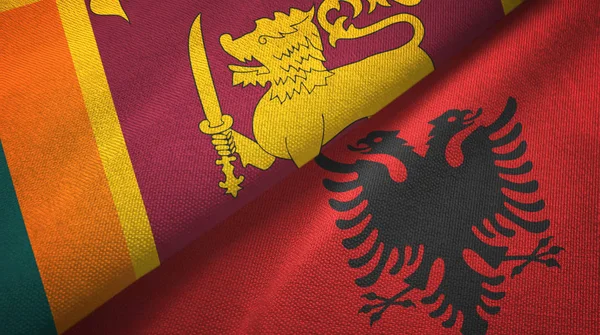 スリランカとアルバニア2つの旗織物布、生地の質感 — ストック写真
