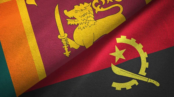 Sri lanka und angola zwei flaggen textiltuch, textur — Stockfoto