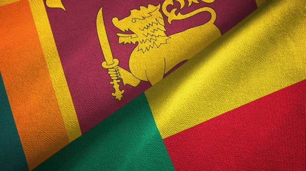 Sri Lanka en Benin twee vlaggen textiel doek, weefsel textuur — Stockfoto