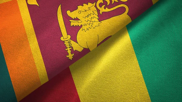 Sri Lanka en Guinee twee vlaggen textiel doek, weefsel textuur — Stockfoto