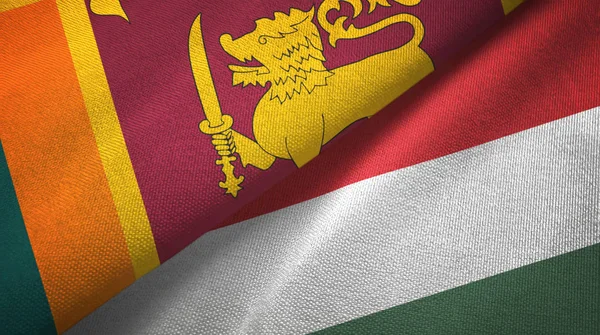 Sri Lanka i Węgry dwie flagi tkanina tekstylna, tekstura tkaniny — Zdjęcie stockowe