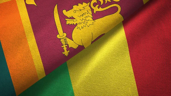 Sri Lanka en Mali twee vlaggen textiel doek, weefsel textuur — Stockfoto