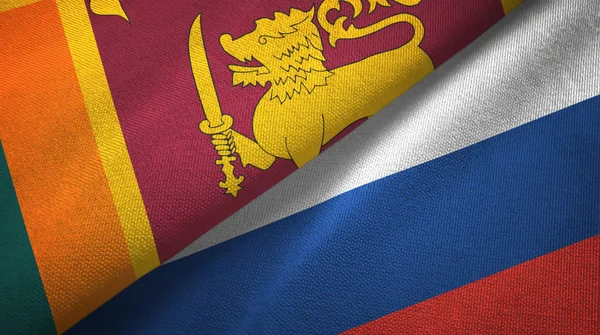 Sri Lanka e Rússia duas bandeiras de pano têxtil, textura de tecido — Fotografia de Stock
