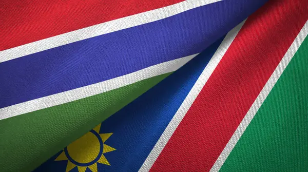 Gambia and Namibia two flags textile cloth, fabric texture — Stock Photo, Image
