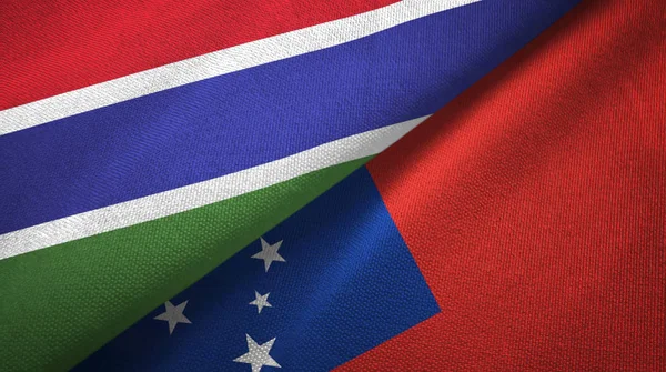 Gambia a Samoa dvě vlajky textilní tkaniny, textura textilií — Stock fotografie