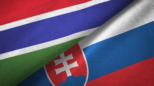Гамбія і Словаччина два прапори текстильна тканина, текстура тканини — стокове фото