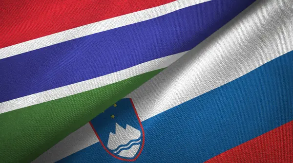 冈比亚和斯洛文尼亚两面旗帜纺织布，织物质地 — 图库照片