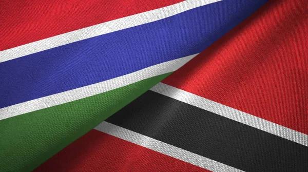 Gambia a Trinidad a Tobago dvě vlajky textilní tkaniny, textura textilií — Stock fotografie