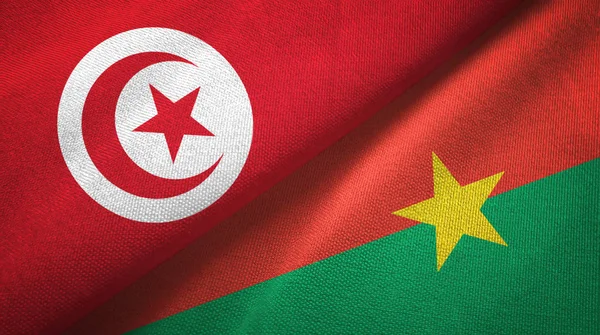 Tunus ve Burkina Faso iki bayraklar tekstil kumaş, kumaş doku — Stok fotoğraf