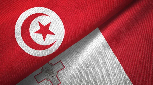 Tunisien och Malta två flaggor textil trasa, tyg textur — Stockfoto
