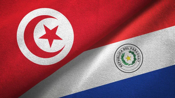 Туніс і Парагвай два прапори текстильної тканини, текстура тканини — стокове фото
