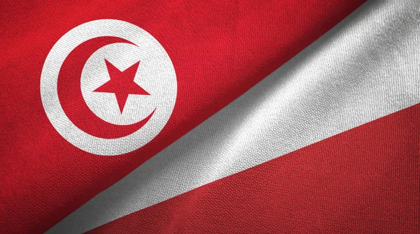 Туніс і Польща два прапори текстильна тканина, текстура тканини — стокове фото