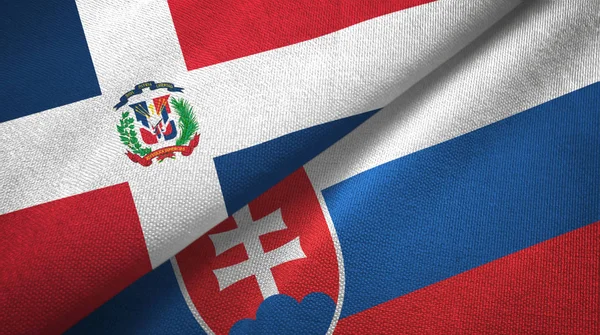 Dominican Republic and Slovakia two flags textile cloth, fabric texture — Stock Photo, Image