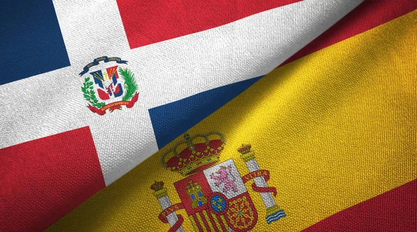 República Dominicana y España dos banderas tela textil, textura de la tela — Foto de Stock