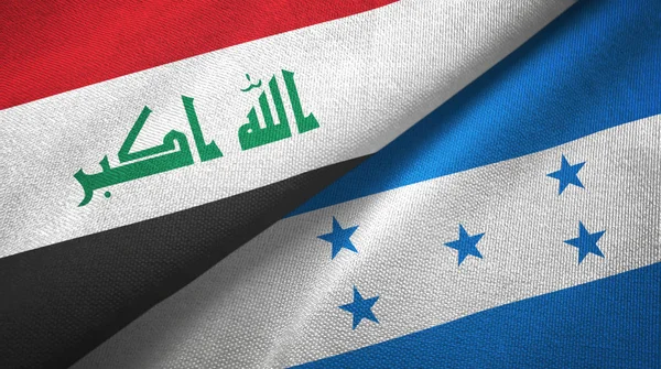 Irak und honduras zwei flaggen textiltuch, textur — Stockfoto