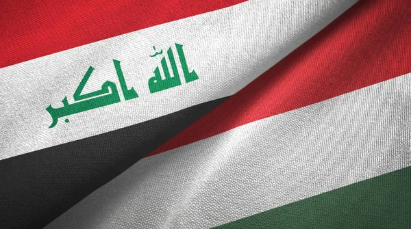 イラクとハンガリーの2つの旗織物布、生地の質感 — ストック写真