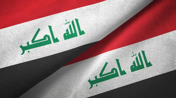 Irak dwie flagi tkanina tekstylna — Zdjęcie stockowe