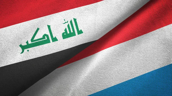 Irak und Luxemburg zwei Flaggen Textiltuch, Textilstruktur — Stockfoto