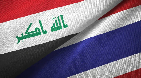 Iraque e Tailândia duas bandeiras de pano têxtil, textura de tecido — Fotografia de Stock