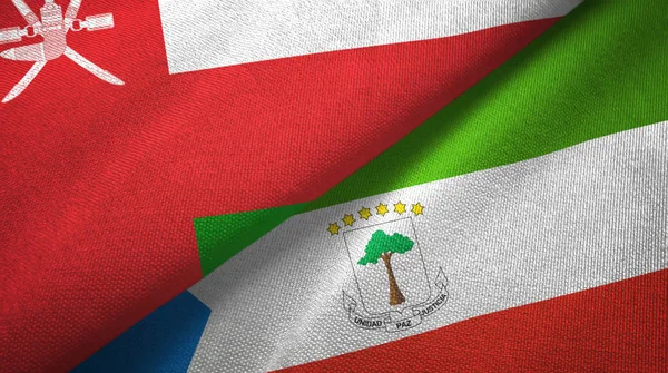 Oman and Equatorial Guinea two flags textile cloth, fabric texture — Stock Photo, Image