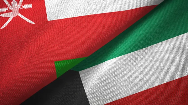 Oman and Kuwait two flags textile cloth, fabric texture — Stock Photo, Image