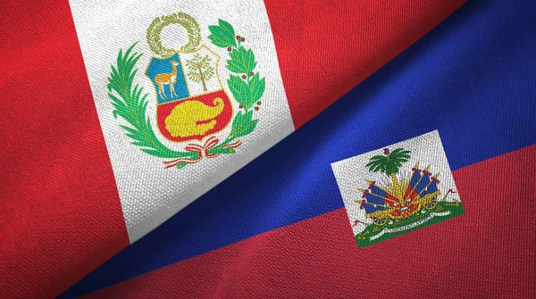 Peru i Haiti dwie flagi tkanina tekstylna, tekstura tkaniny — Zdjęcie stockowe