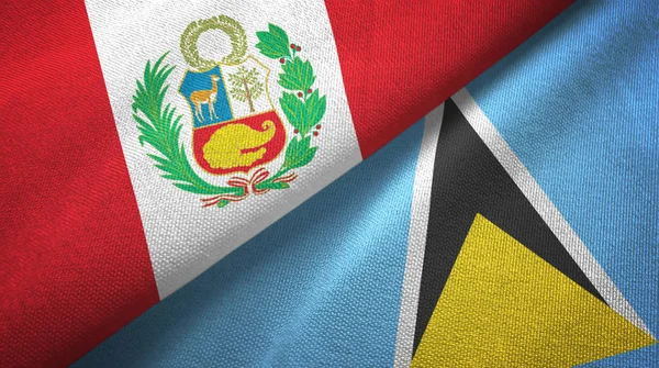 Perú y Santa Lucía dos banderas tela textil, textura de tela — Foto de Stock