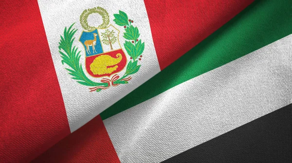 Peru en Verenigde Arabische Emiraten twee vlaggen textiel doek, weefsel textuur — Stockfoto