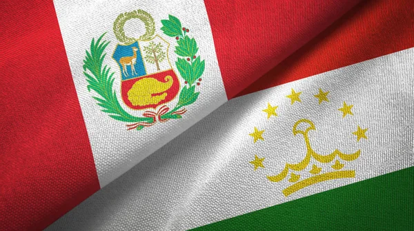 Peru and Tajikistan two flags textile cloth, fabric texture — Stock Photo, Image