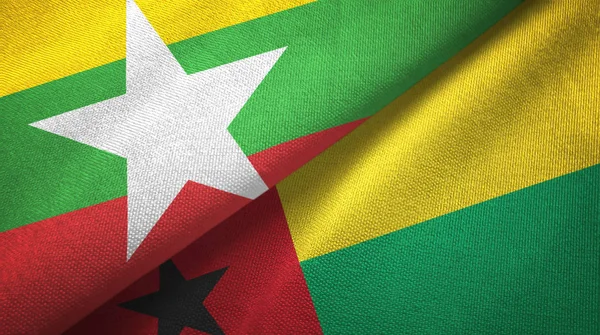 Myanmar e Guinea-Bissau due bandiere tessuto, tessitura del tessuto — Foto Stock