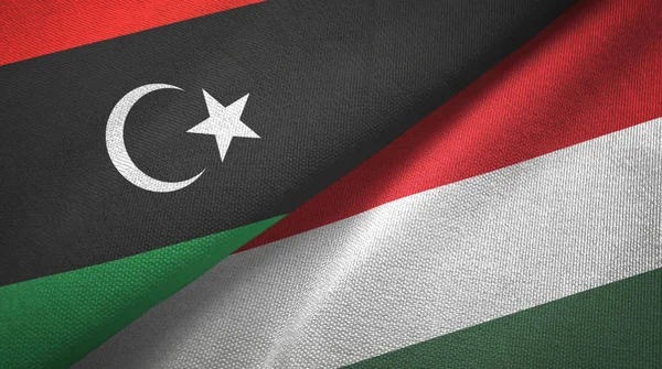 Libya and Hungary two flags textile cloth, fabric texture