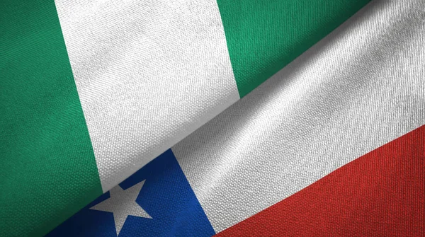 Nigeria en Chili twee vlaggen textiel doek, stof textuur — Stockfoto