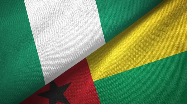 Nigeria e Guinea-Bissau due bandiere tessuto, tessitura del tessuto — Foto Stock